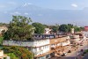 View on Mount Kilimanjaro with buildings of Moshi
