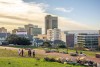People walking across the grass on the donkin in Port Elizabeth