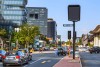 Traffic intersection with cars and modern buildings, Johannesburg